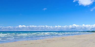 The beach in the summertime at the Mermaid Wasaga Beach Resort