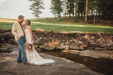 The Emerald Hill outdoor wedding venue near Charlotte, NC featuring a couple at our natural spring