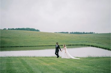The Emerald Hill wedding venue near Charlotte featuring a bride and groom by our water feature