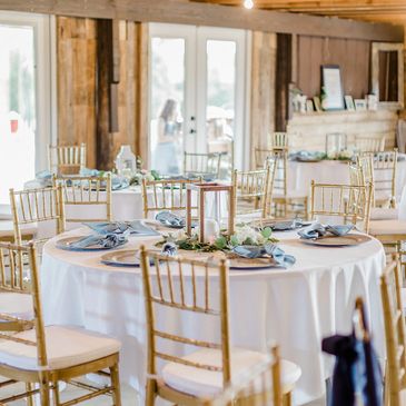 Couples love our gold chiavari chairs and floor length linens to glam up the space.  