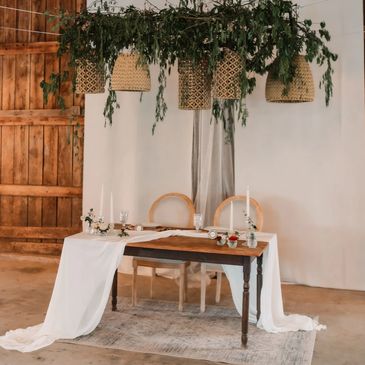 Floral installation over the sweethearts table (by Wildflowers Florals)  
Laze L Farm Photography