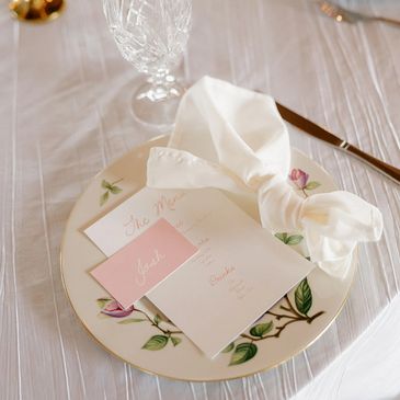 all-inclusive NC wedding venue featuring mis-matched china at each place setting for the reception.