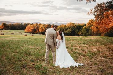 The Emerald Hill outdoor wedding venue near Charlotte, NC featuring a couple & our mountain views 