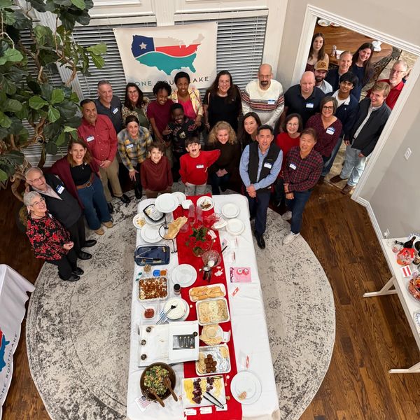 One Southlake speakers and supporters gather for the annual international potluck party. 