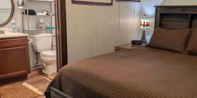Cozy bedroom with attached bathroom.