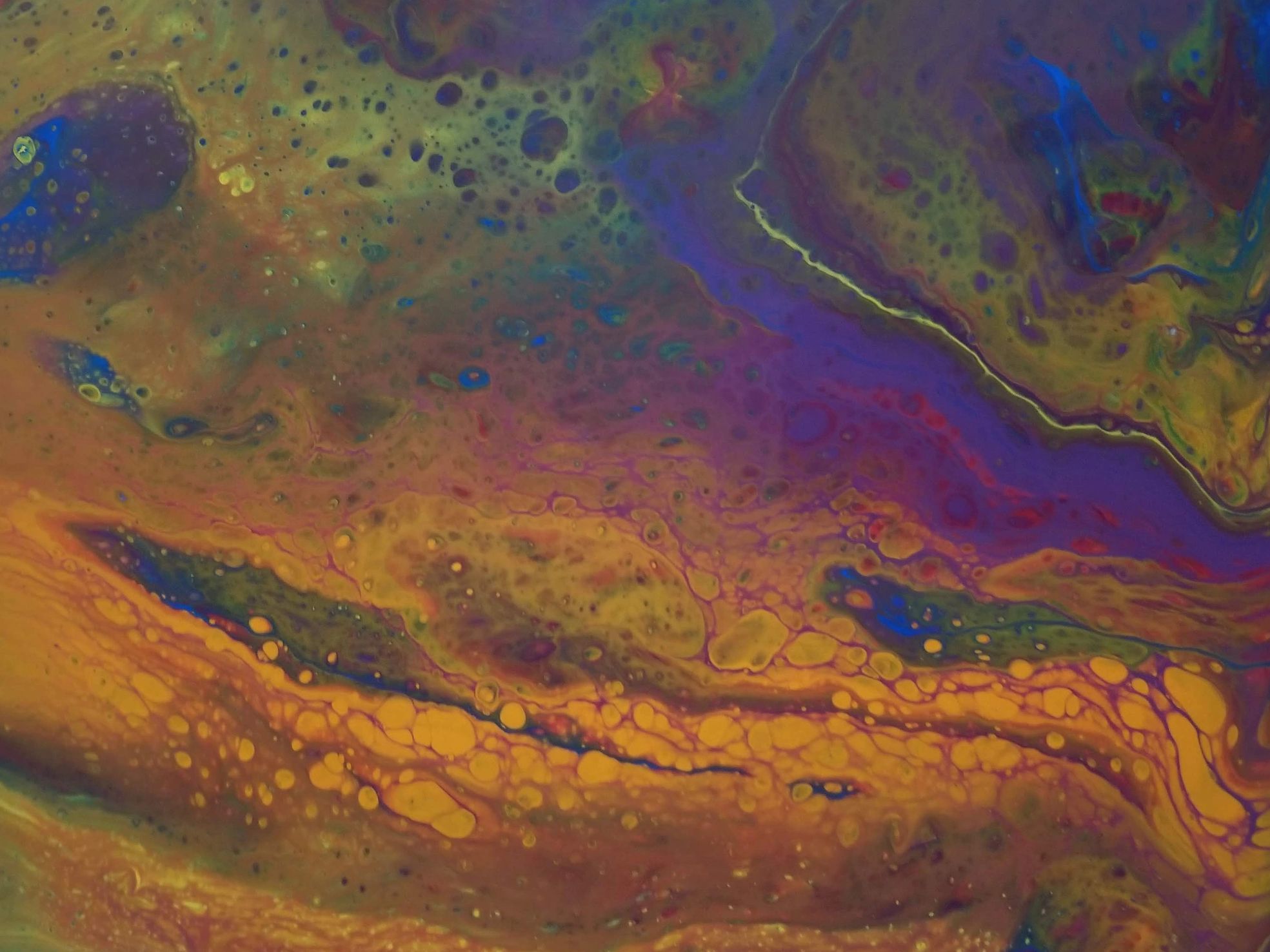 An acrylic pouring by horror mystery fantasy  speculative fiction author Jaime Johnesee. 