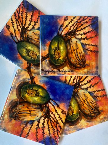 Vibrant paintings featuring tropical palm fruits with a colorful sunset background.