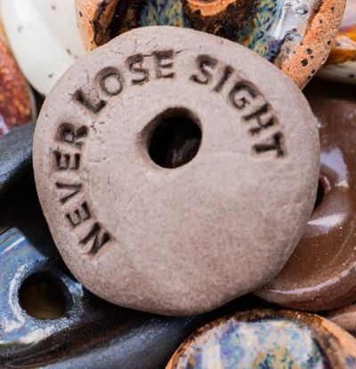 Ceramic Stones - handcrafted ceramic keepsakes supporting retinal disease research and awareness