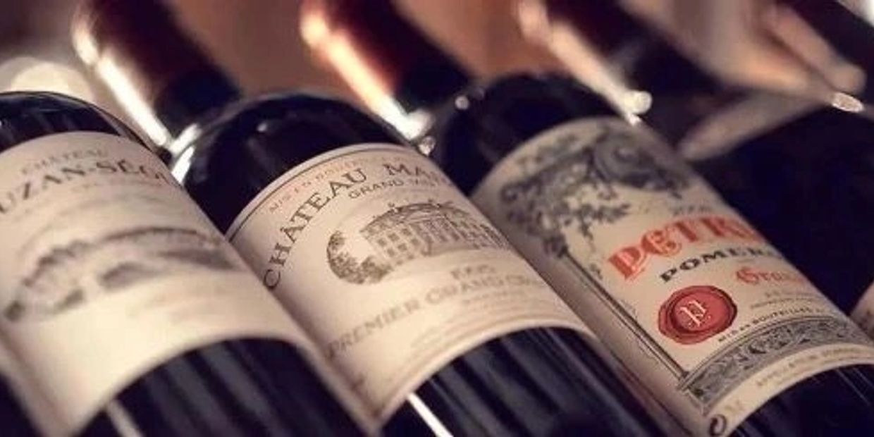 Close-up of wine bottles with detailed labels.
