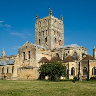 Historic stone cathedral under a clear blue sky.