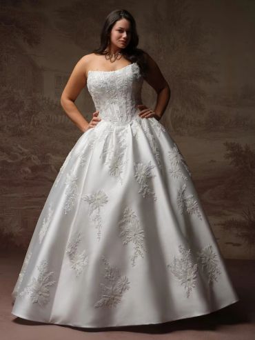 Woman in elegant strapless white wedding dress.