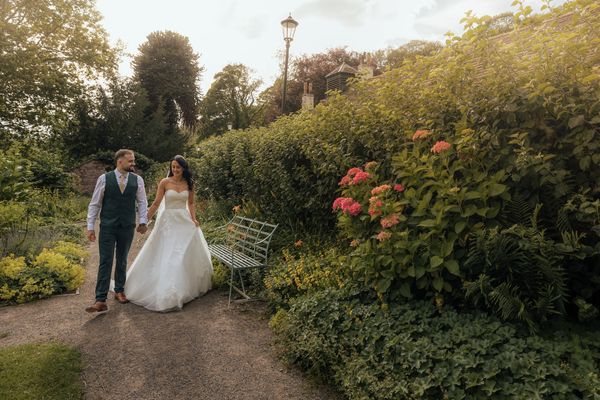 Newly Wed garden walk at Chadkirk Chapel summer wedding, Romiley, Manchester 