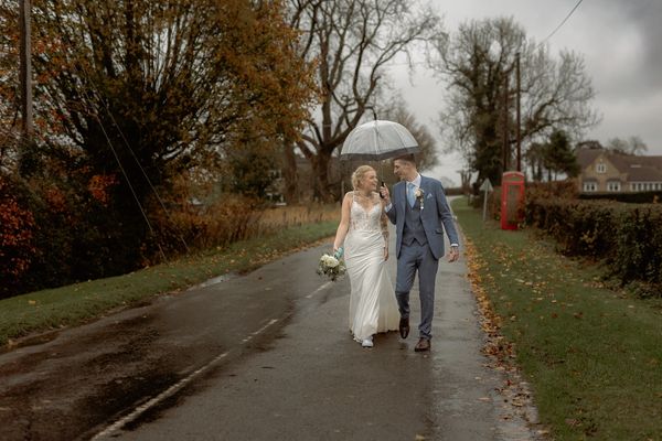 newly wed walk on country side road at The White Hart Inn wedding, Alfreton Derbyshire