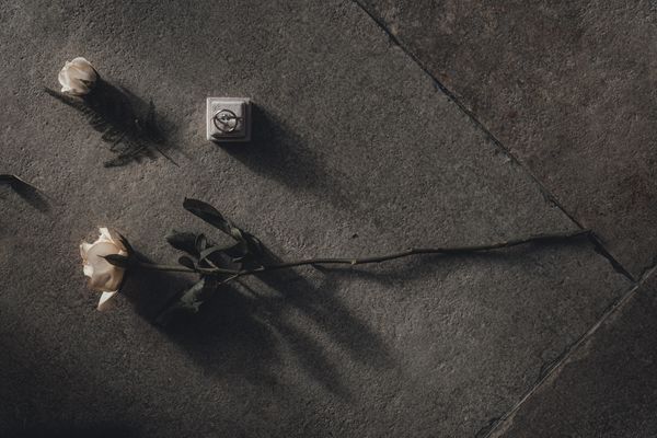 wedding ring details & single rose Whistle Barns Wedding Venue, Nottingham