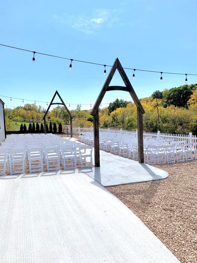 Beautiful outdoor wedding ceremony location with arbors. 