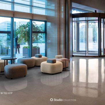 Modern lobby with comfortable seating and large windows.