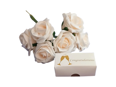 Ivory wedding flowers with Congratulations box of chocolates