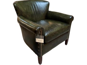 Classic dark green leather armchair with wooden legs and nailhead trim.