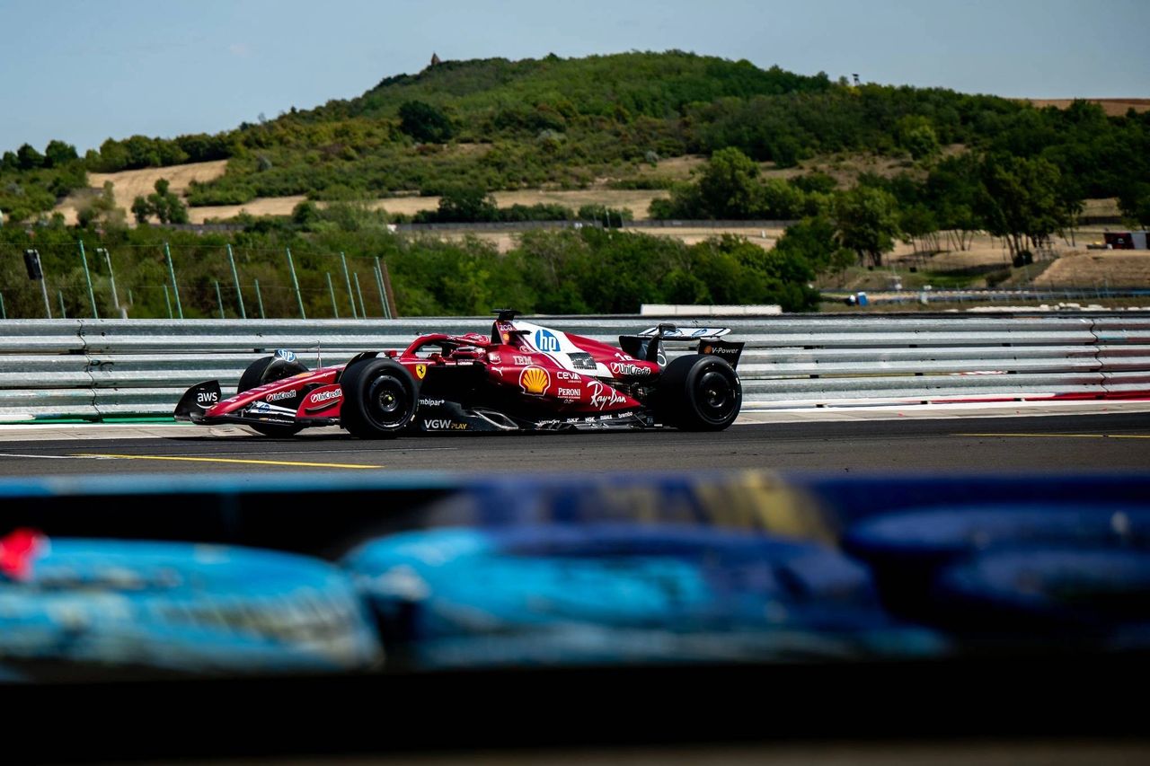 Charles Leclerc runs Pirelli’s 2026 prototype tyres at the Hungaroring in a modified SF-25, adapted to the upcoming narrower front and rear sizes.