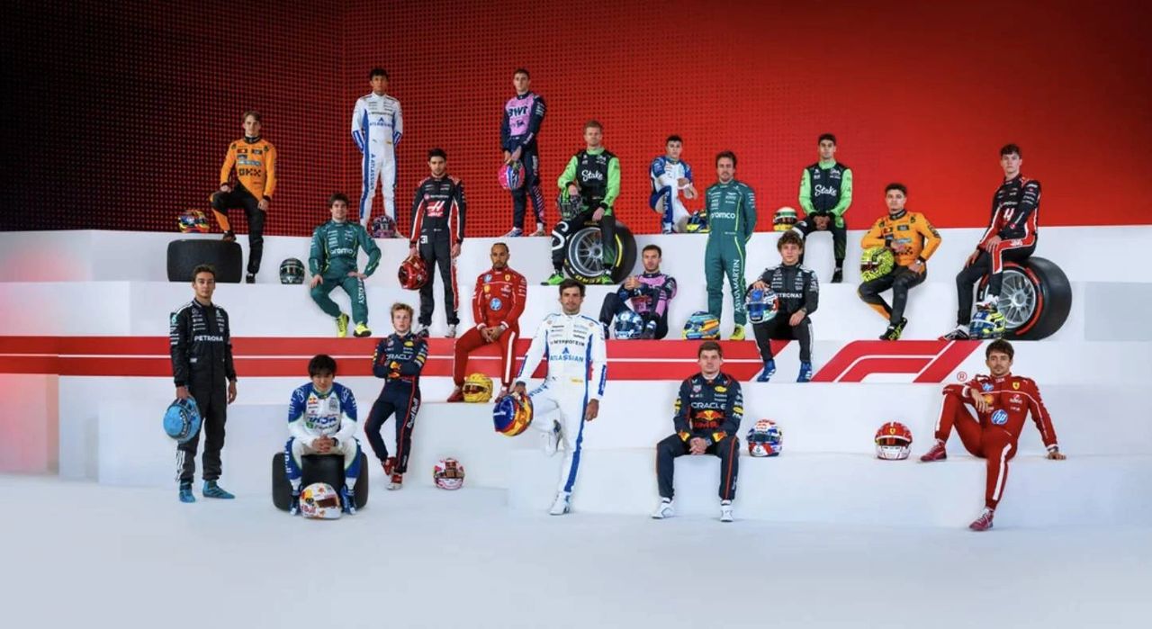 Group photo of the 2025 Formula 1 drivers in full race suits and team colours ahead of the season opener. Featuring Lewis Hamilton, Max Verstappen, Lando Norris, Charles Leclerc, and more Group photo of the 2025 Formula 1 drivers in full race suits and team colours ahead of the season opener. Featuring Lewis Hamilton, Max Verstappen, Lando Norris, Charles Leclerc, and more