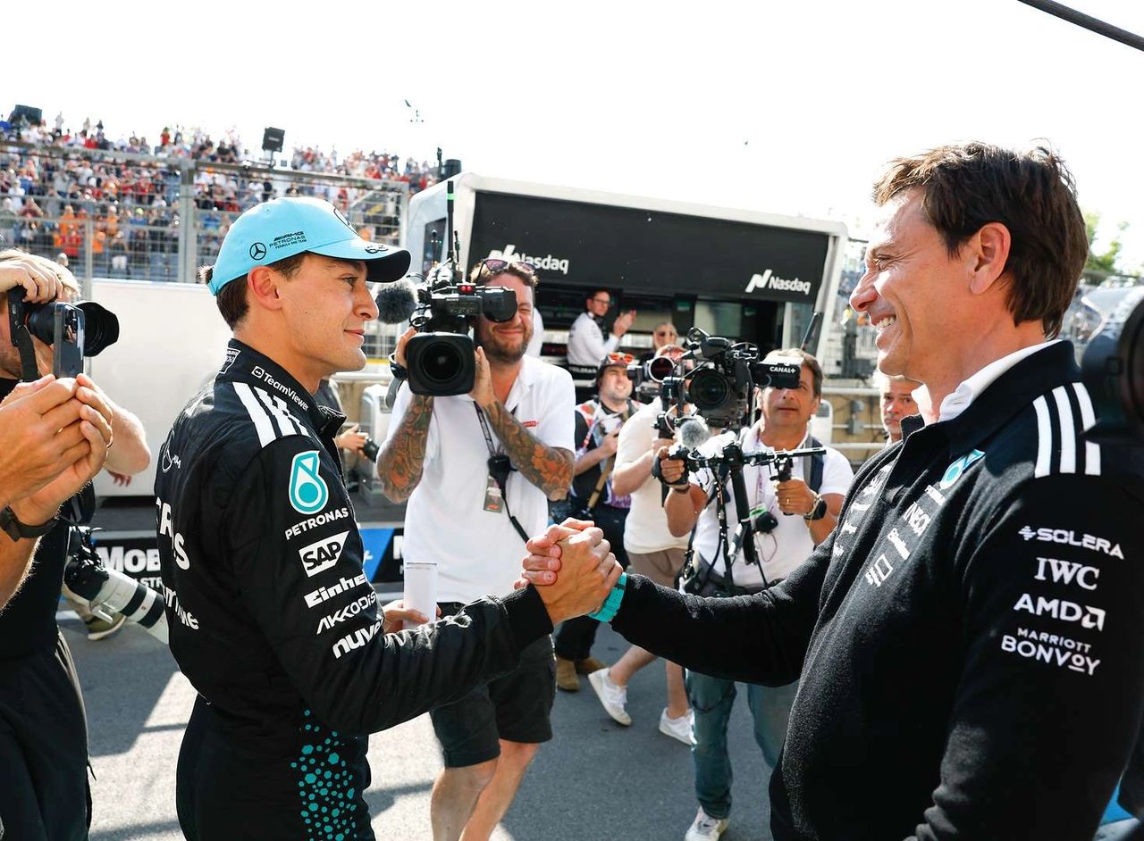 George Russell shakes hands with Mercedes Team Principal Toto Wolff during the 2025 Canadian Grand Prix in Montreal. 📷 Jiri Krenek / Mercedes-Benz Archive George Russell shakes hands with Mercedes Team Principal Toto Wolff during the 2025 Canadian Grand Prix in Montreal. 📷 Jiri Krenek / Mercedes-Benz Archive