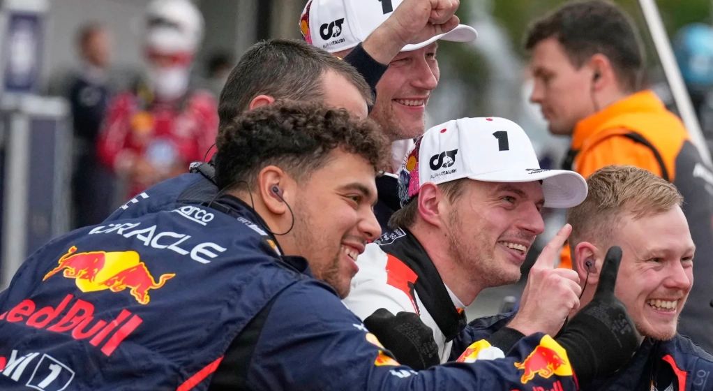 Red Bull driver Max Verstappen, center, of the Netherlands celebrates after winning the Japanese Formula One Grand Prix at the Suzuka Circuit in Suzuka, central Japan, Sunday, April 6, 2025. (AP Photo/Hiro Komae)