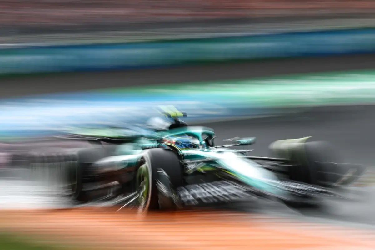 Aston Martin Formula 1 car blurred in motion at the 2025 Dutch Grand Prix, representing the tight midfield battle heading into Monza