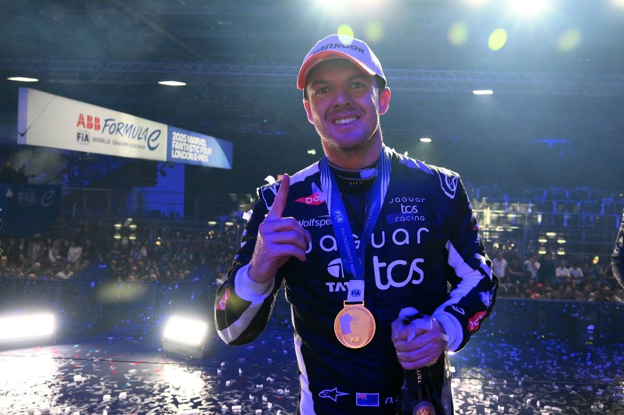 Nick Cassidy celebrates on the podium after winning Round 16 of the 2025 ABB FIA Formula E World Championship in London, marking his third consecutive win for Jaguar TCS Racing. Nick Cassidy celebrates on the podium after winning Round 16 of the 2025 ABB FIA Formula E World Championship in London, marking his third consecutive win for Jaguar TCS Racing.