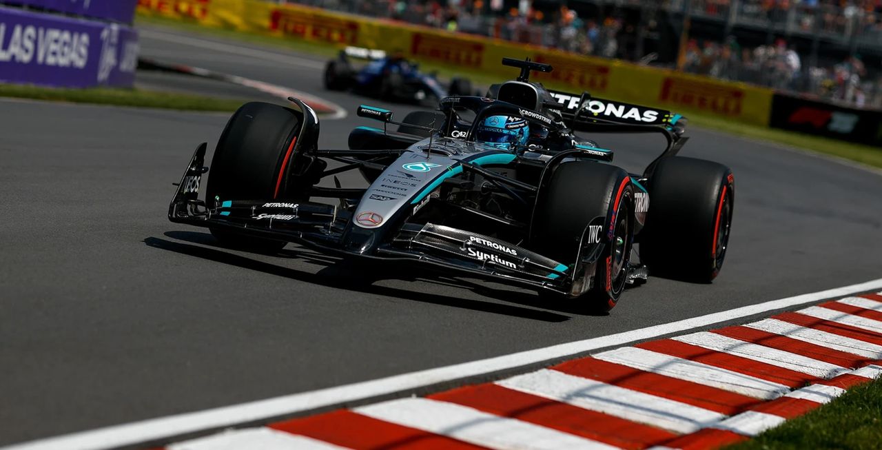 George Russell driving the Mercedes W15 during Canadian Grand Prix Qualifying, securing pole position at Circuit Gilles-Villeneuve in Montreal.