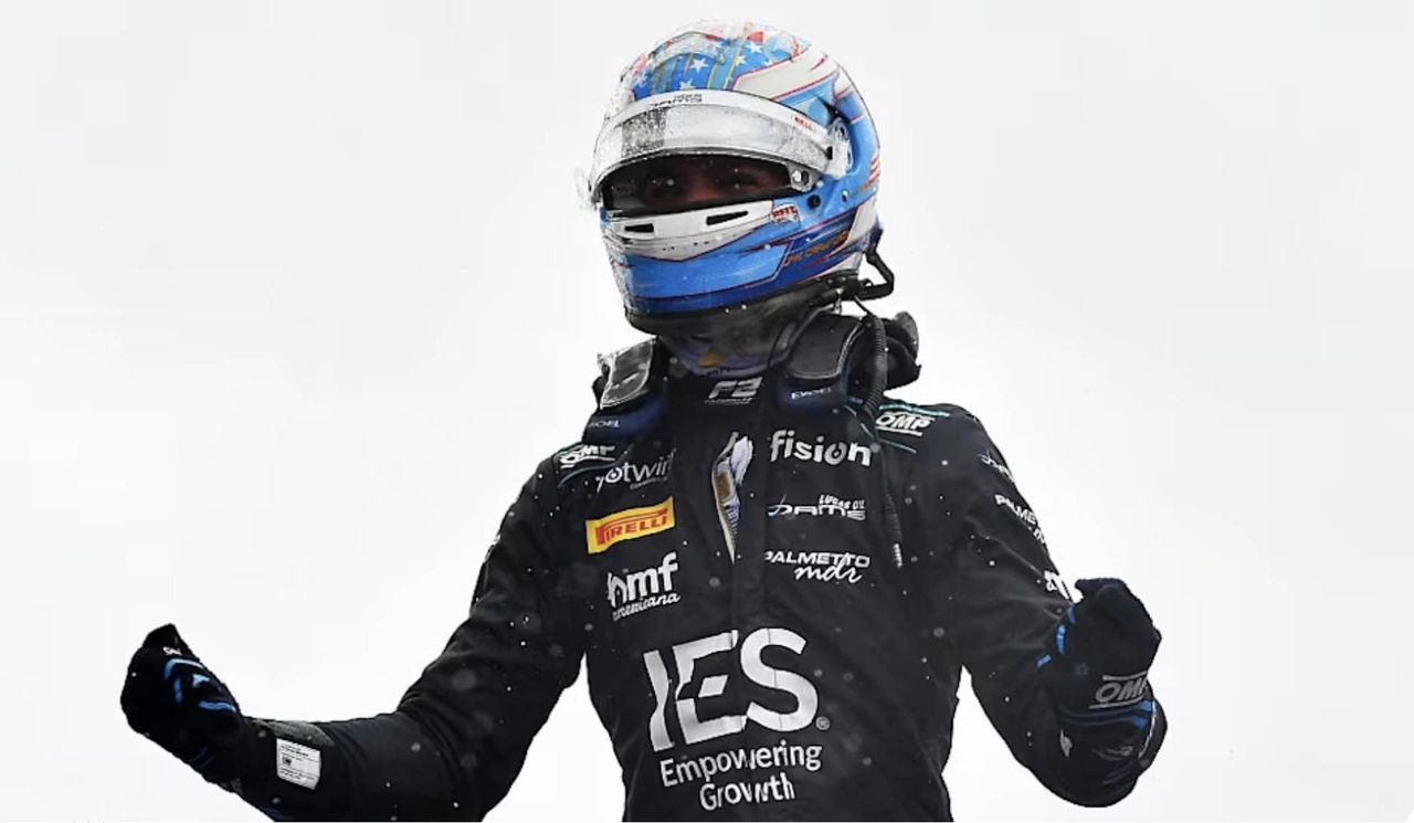 Jak Crawford raises his fists in celebration after winning the 2025 Silverstone Formula 2 Feature Race in wet conditions, driving for DAMS Lucas Oil. Jak Crawford raises his fists in celebration after winning the 2025 Silverstone Formula 2 Feature Race in wet conditions, driving for DAMS Lucas Oil.