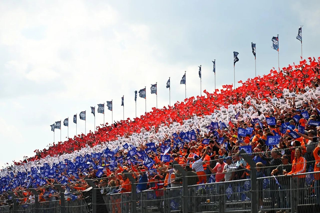 Dutch F1 fans in red, white and blue grandstands at Zandvoort during 2024 Formula 1 Dutch Grand Prix atmosphere crowd Dutch F1 fans in red, white and blue grandstands at Zandvoort during 2024 Formula 1 Dutch Grand Prix atmosphere crowd