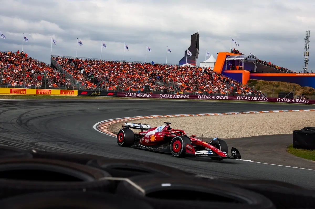 Ferrari Formula 1 car racing at the 2025 Dutch Grand Prix with tifosi in the background, symbolising pressure ahead of Monza