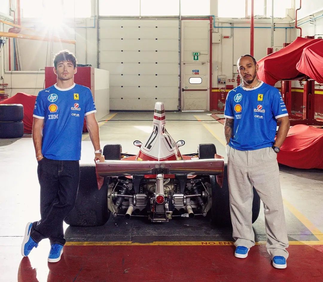 Leclerc and Hamilton in Ferrari’s blue kit with Lauda’s 312T, cropped for header focus ahead of the 2025 Italian Grand Prix tribute.