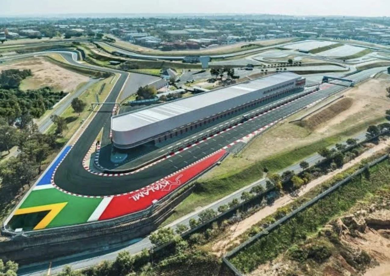 Aerial view of Kyalami Grand Prix Circuit showing the South African flag runoff and FIA-ready pit buildings ahead of proposed Formula 1 return.