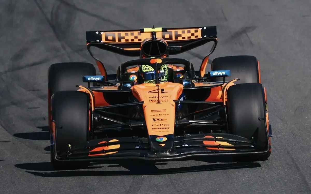Lando Norris driving the McLaren MCL39 Formula 1 car at Zandvoort during the 2025 Dutch Grand Prix weekend, before retiring with an oil leak.