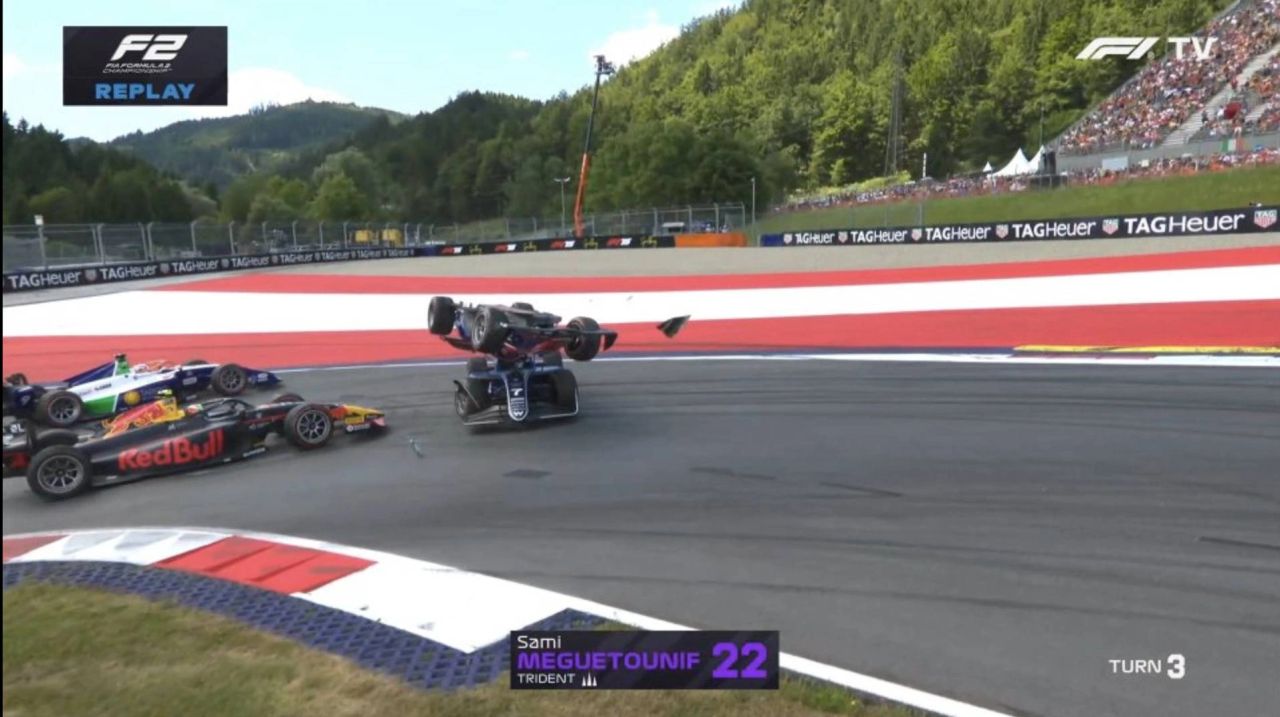 Formula 2 crash at Spielberg Turn 3 – TRIDENT car flips over in collision with Red Bull-backed Browning and Lindblad. Halo device credited for driver safety. Formula 2 crash at Spielberg Turn 3 – TRIDENT car flips over in collision with Red Bull-backed Browning and Lindblad. Halo device credited for driver safety.