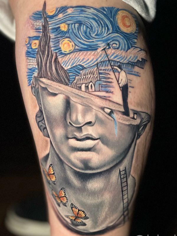 picasso statue color tattoo on female leg. high quality design lock haven pa