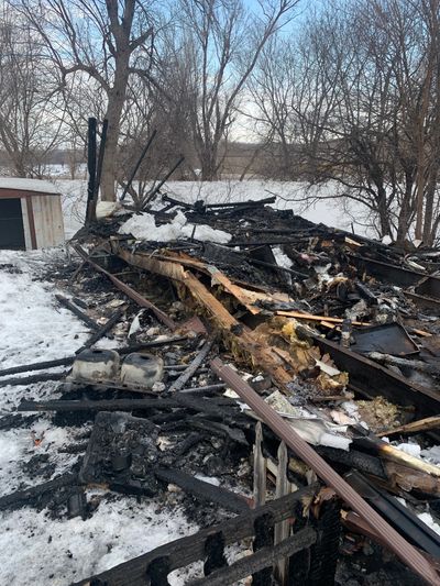 Demolition and haul away site of burned down trailer house.