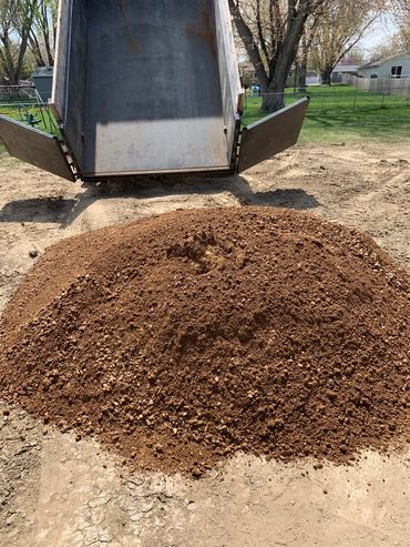5 tons of packing gravel delivered and dumped