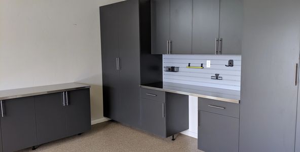 Garage Cabinets in Slate with a stainless steel workbench