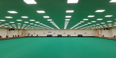 An indoor bowls green