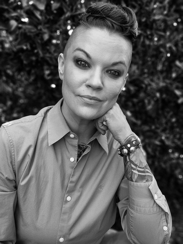 Therapist, Hendrix Scott, headshot in black and white