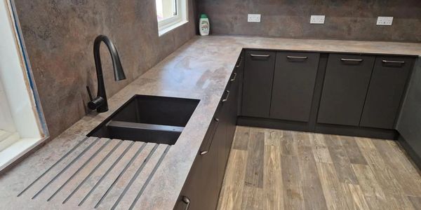 Stone effect worktops fitted by AJ Joinery