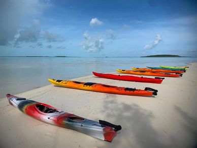 Out-Island Explorers kayaks on the beach.