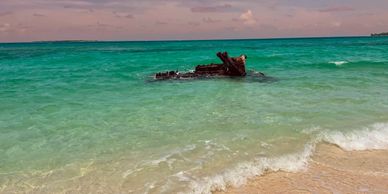 Bulldozer reef Great Exuma Bahamas, located on Paradise Bay Beach.