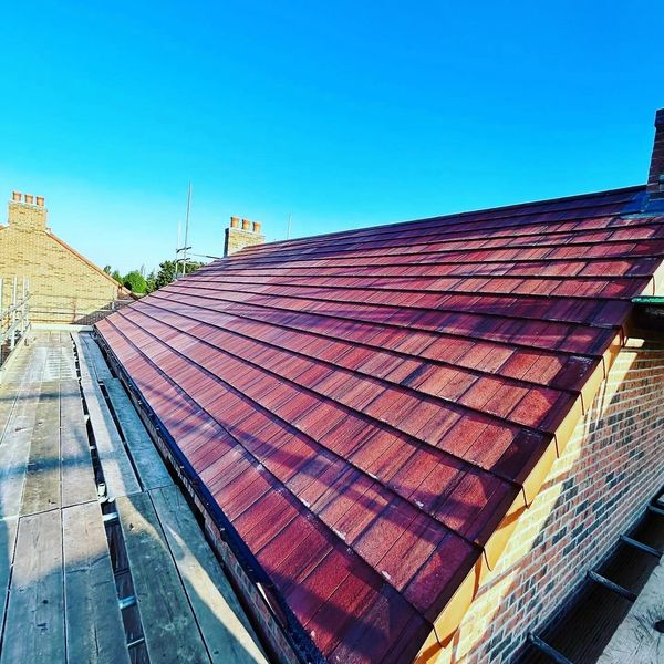 Finished roof with red concrete tiles 