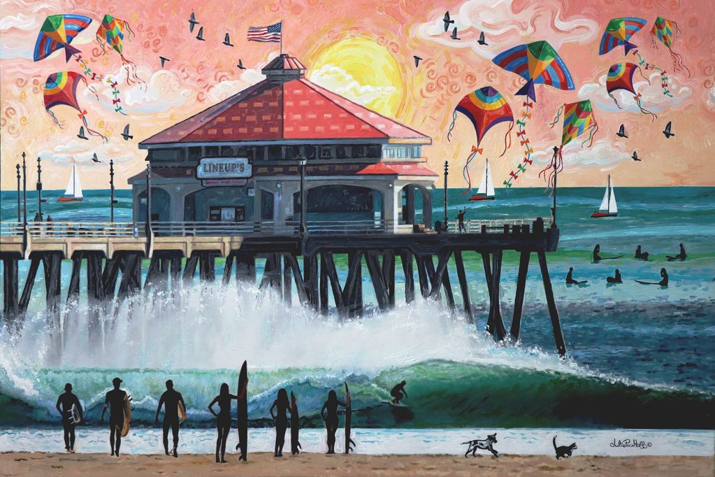 Beach pier with kites and surfers in splashing waves.