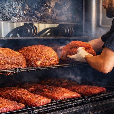 Smoked BBQ babbyback ribs pulled pork brisket barbecue