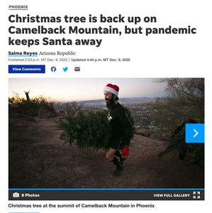 Ben Shapiro from CamelbackCulture carrying up the Camelback Christmas tree 