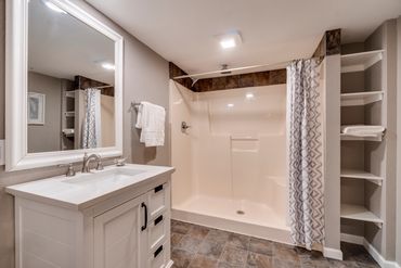 New vanity, shower, shelving, flooring and walls